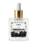 Black Obsidian Gemstone Body Oil — Protection & Grounding Shimmer Oil with Amber & Vanilla - by Circe Boutique